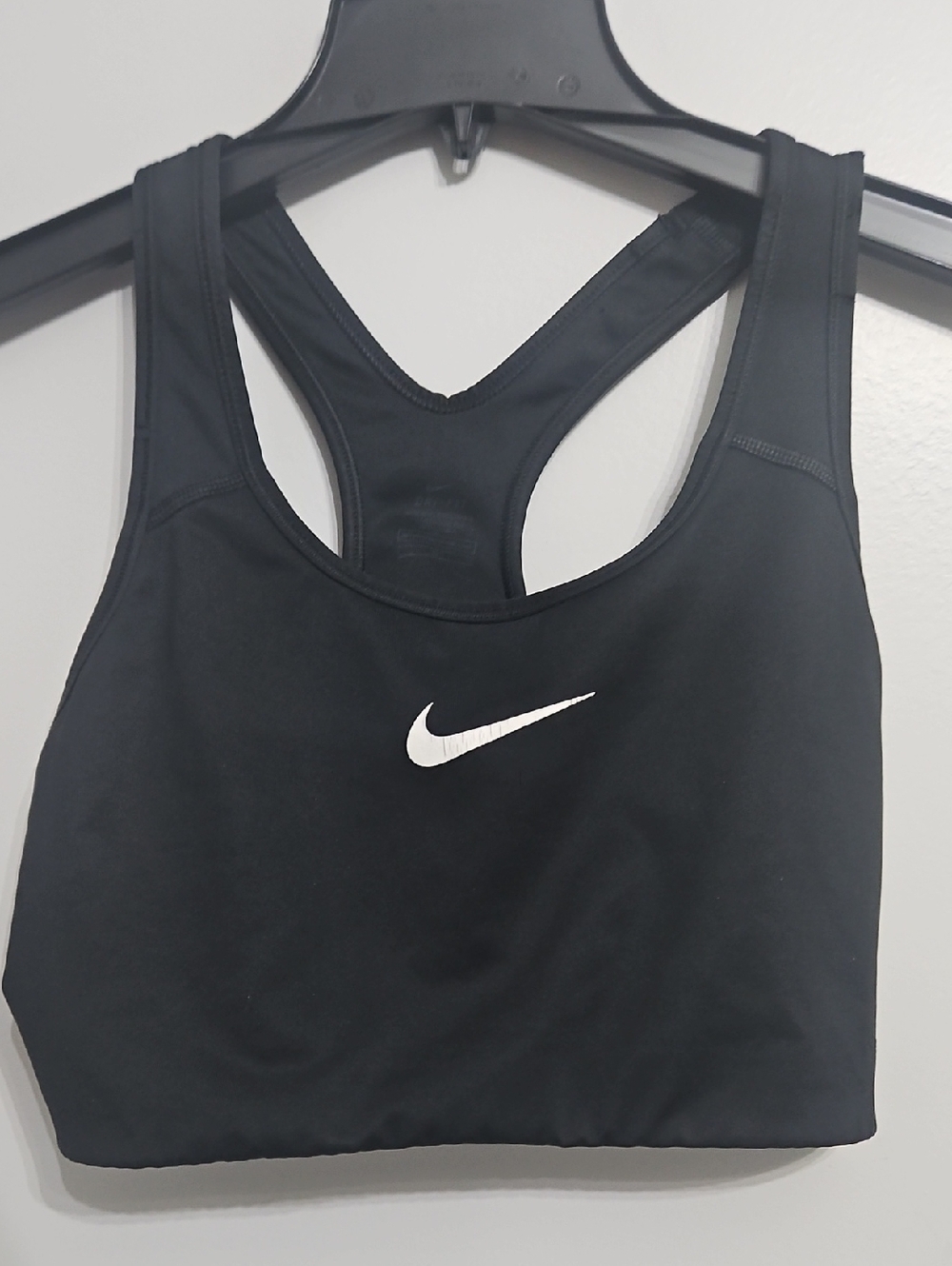 Nike Black Racerback Sports Bra with White Swoosh. Size L.